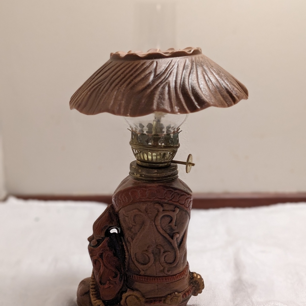 Unique small cowboy boot oil lamp